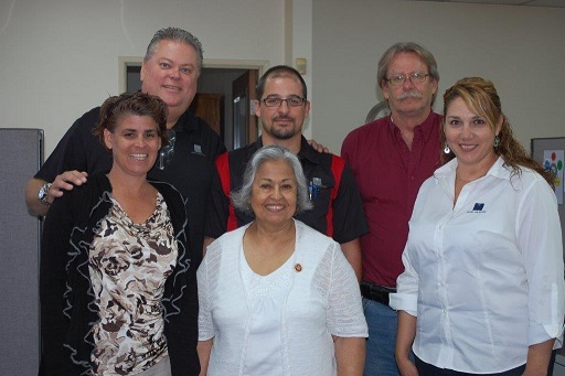 Congresswoman McLeod shown meeting with the Metric Machining management team.